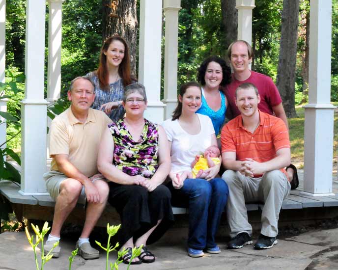 Family picture with new young baby